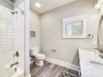 Shared Guest Bath with Double Vanity and Shower/Tub Combo at 28 Stoney Creek